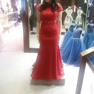 Stunning red prom dress by the brand Blush